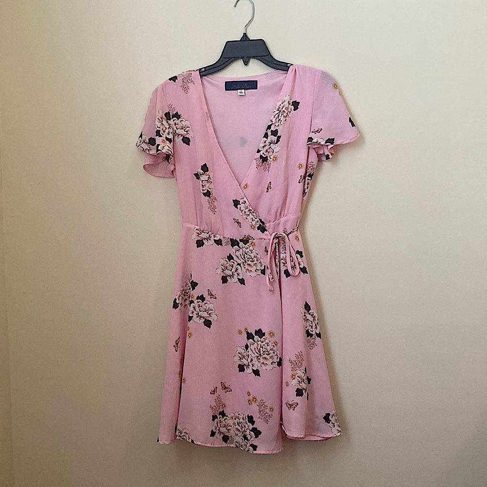 Beautiful pink flowered dress. Perfect for the summer. Brand new. Never worn.